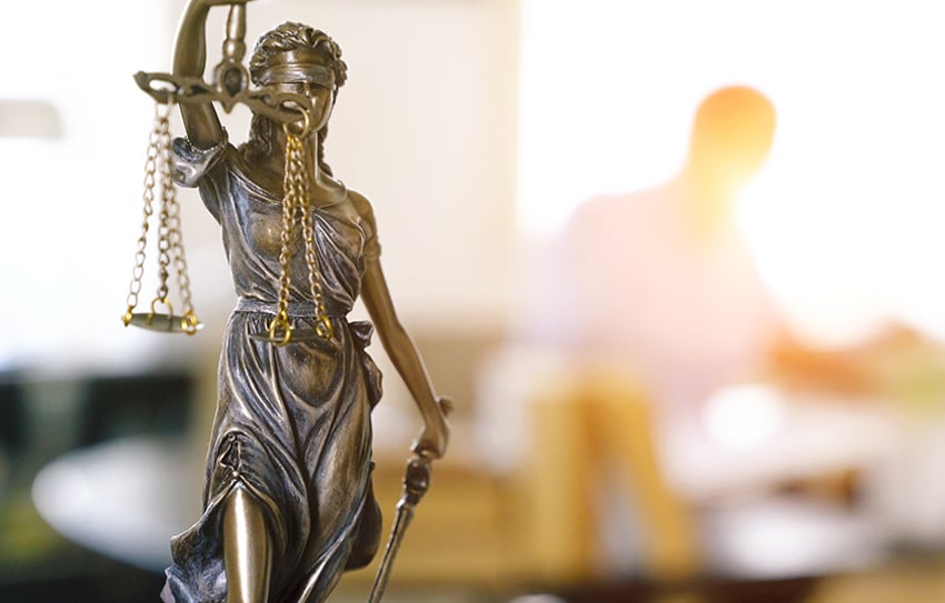 Close-Up Of Lady Justice In Office The Statue of Justice - lady justice or Iustitia / Justitia the Roman goddess of Justice in lawyer office